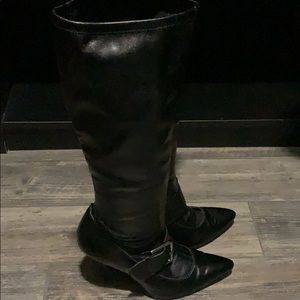 Black knee high, high heel boots